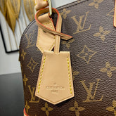 ALMA BB 23 IN BROWN MONOGRAM CANVAS AND BEIGE CALFSKIN TRIM GOLD BUCKLE